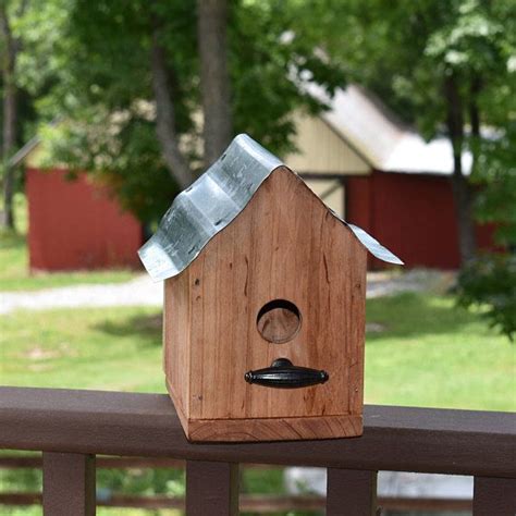 bird houses with metal roofs made of lisies|birdhouse kits for sale.